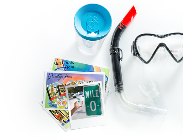 Tervis tumbler, GA postcards and moss